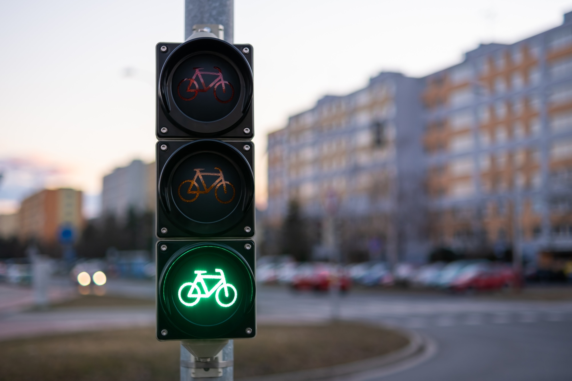 Traffic green light letting bicycle to pass in city
